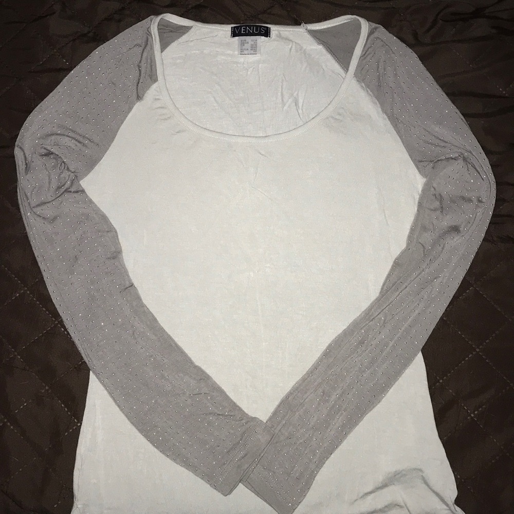 Gray top with small silver studs on arms